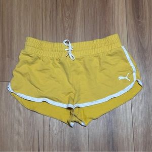 PUMA yellow athletic shorts